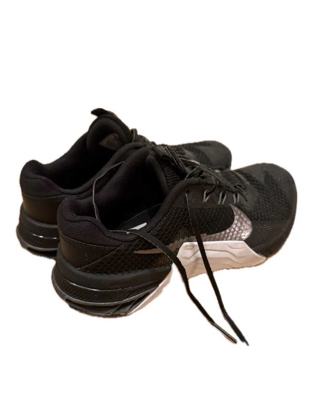 Nike women’s Metcon Black Athletic Sneakers with Silver Swoosh